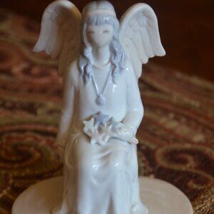 FLAVIA Angel Holding Stars – “Faith”